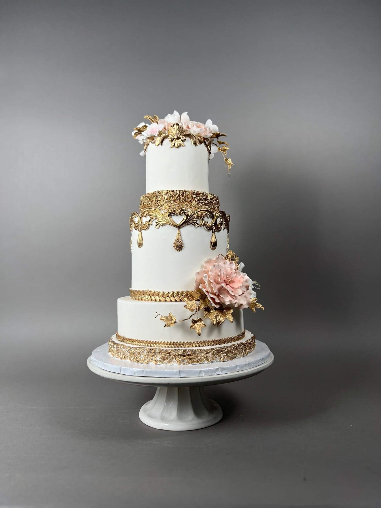 Baroque white and gold sculpted tier with pink sugar peony